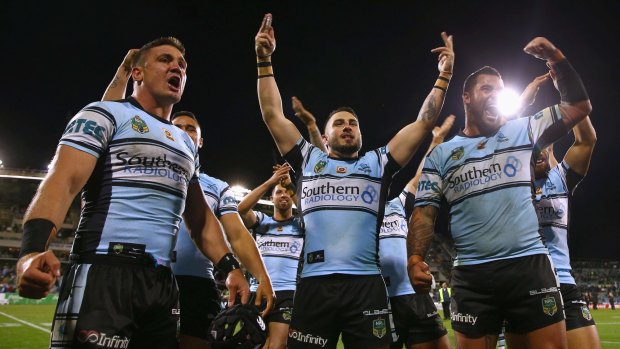 Victory: Chris Heighington, Jack Bird and Andrew Fifita celebrate the win.
