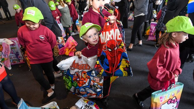 Joshua from Mahogany Rise Primary School in Frankston North tests out this year's showbags. 