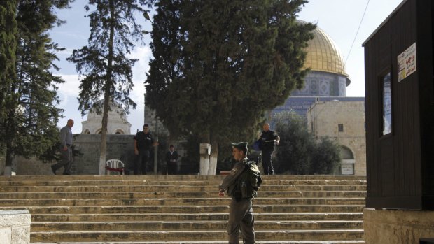 Israeli police stand guard at the entrance to Al-Aqsa compound in Jerusalem's Old City on Thursday.