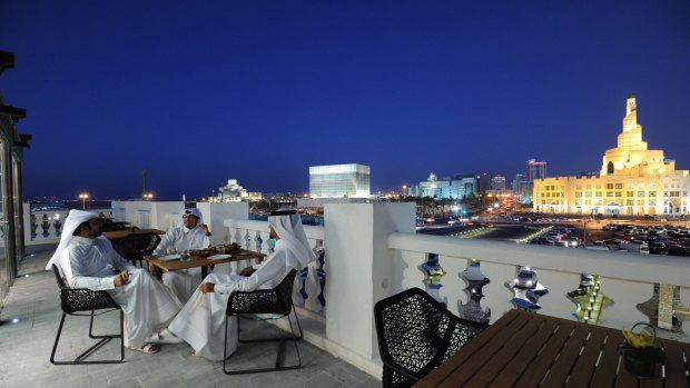 Taking the night air at Souq Waqif Boutique Hotels.