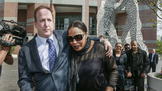 Attorney Richard Busch, left, and Nona Gaye, daughter of the late Marvin Gaye, after a jury awarded the singer's children nearly $US7.4 million.
