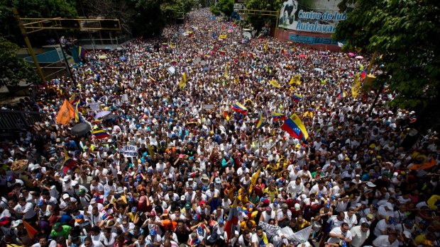 Demonstrators take part in the "taking of Caracas" march in on Thursday.