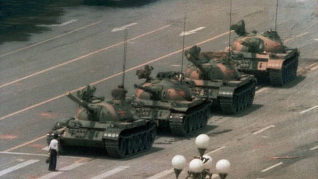 The iconic image of "Tank Man" standing in front of a line of tanks after the 1989 Tiananmen Square massacre.