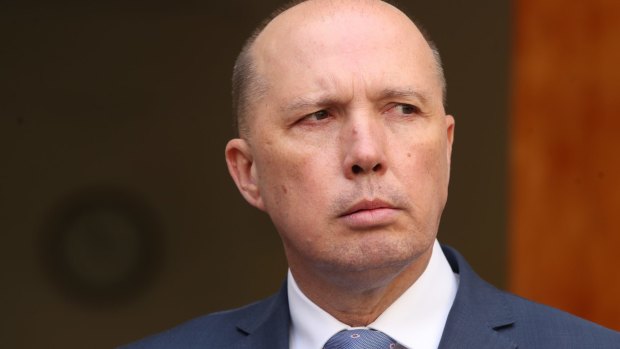 Immigration Minister Peter Dutton is working to clear the "legacy caseload" of boat arrivals.