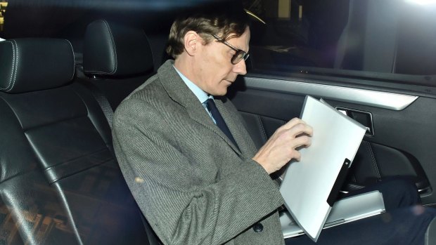 Suspended chief executive of Cambridge Analytica Alexander Nix leaves the offices in central London on Tuesday, March 20.