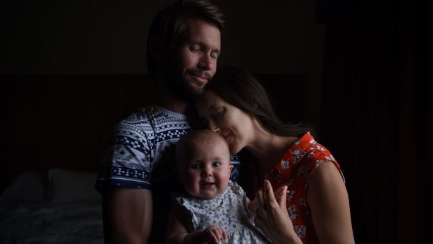 Johnny McElwee (left) and Bethan McElwee (right) hold their 6-month-old daughter Aviana. Aviana has SMA Type One, a rare genetic disease which means she will not live to see her first birthday.