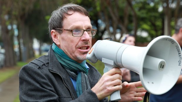 John Kaye addresses a TAFE cuts protest in 2014.