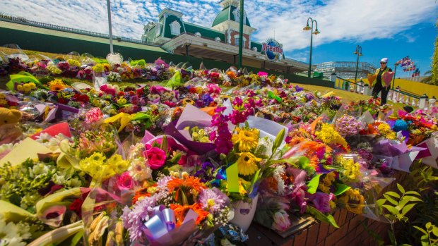 Flower tributes at Dreamworld where four people died after a malfunction with the 'Thunder River Rapids' at the theme park on October 27, 2016.