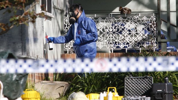 Forensic officers at Linda Adams' home in Lalor Park in 2015.