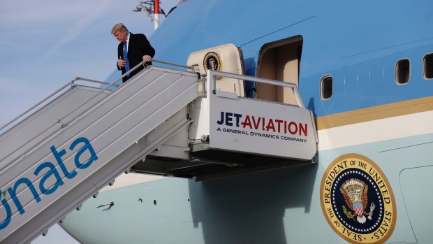 Donald Trump steps off Air Force One.