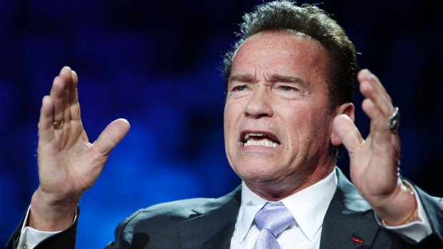 Arnold Schwarzenegger in campaign mode, at an environmental summit in 2017.