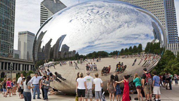 The steel sculpture named Cloud Gate in Millennium Park in downtown Chicago.
