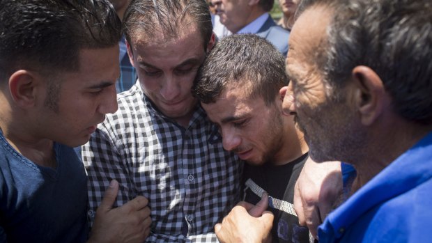 Relatives of 18-month-old Ali Saad-Dawabsheh mourn in July, 2015.  The baby was killed by an arson attack on the family home in the Palestinian village of Duma.