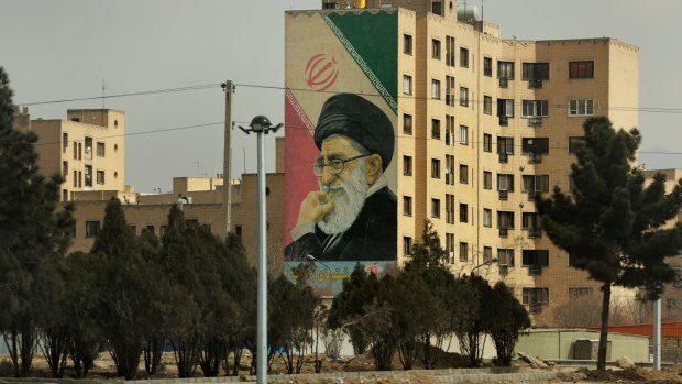 A mural of Iran's supreme leader, Ayatollah Ali Khamenei is painted on the side of an apartment block in south Tehran. Iran has been hard hit by sanctions imposed to pressure it into accepting limits on its nuclear program. 