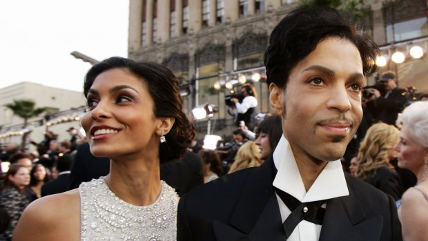 Prince arrives with his then wife Manuela Testolini for the 2005 Academy Awards in Los Angeles. 