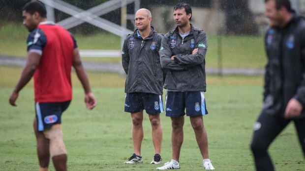 Blast from the past: Nathan Brown and Laurie Daley watch NSW train in 2015.