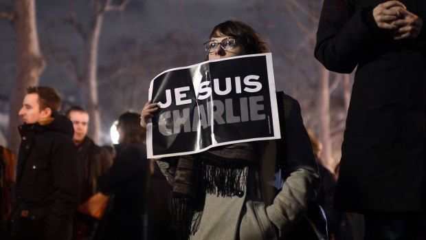 Solidarity: A woman holds a placard reading "I am Charlie" at a gathering on the Place de Republique in Paris. 