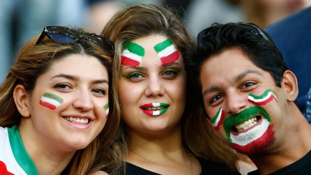 The joy of football ... Fans of IR Iran wait for the 2015 Asian Cup match with Qatar at ANZ Stadium in Sydney.