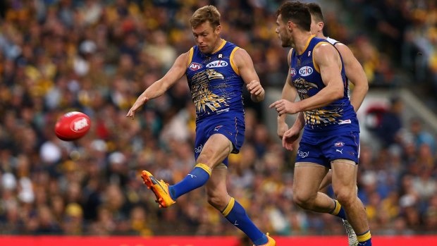 Way of the west: Sam Mitchell sends one long for the Eagles.