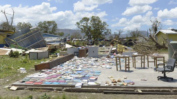 Books recovered from a school are left out to dry in Port Vila.
