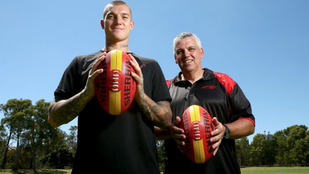 Dustin Martin and Mark Williams with the development football.
