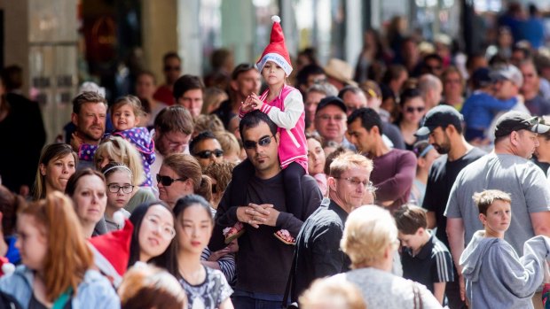 Christmas shopping crowds filled the Bourke Street mall for a frenzy of last-minute buying on Sunday.