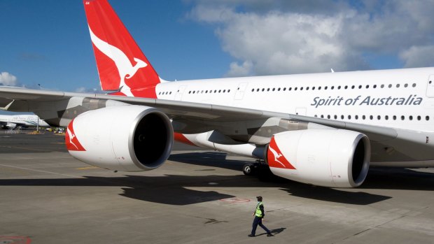 Qantas has posted its "second-highest ever profit", held back mostly by the rising competition from international rivals on its routes.
