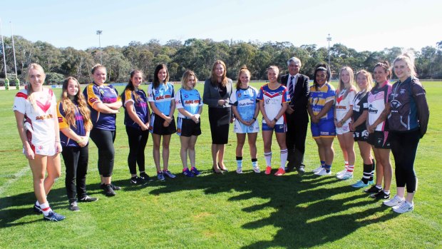 Mark Vergano and Yvette Berry launch the women's league tag competition in Canberra.