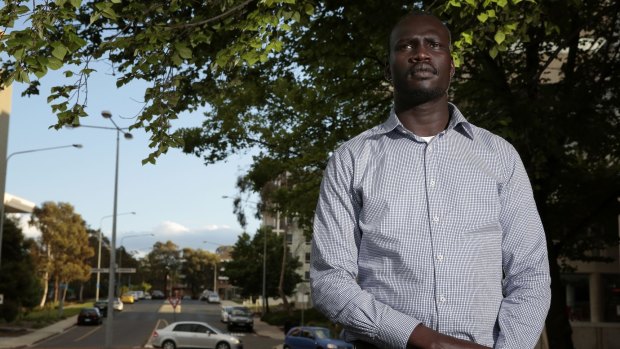 Canberra resident Goch Kot was travelling in a taxi on Thursday night when his driver was attacked by a man with a machete.