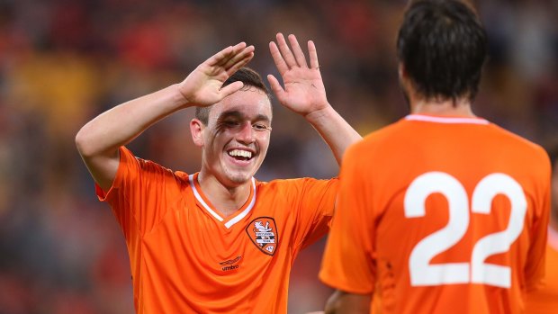 Devante Clut of the Roar celebrates after kicking a goal during the international friendly match between the Brisbane Roar and Villarreal CF at Suncorp Stadium.