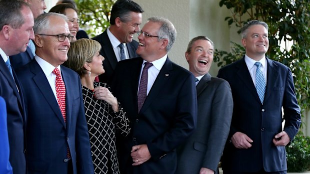 Minister for Defence Industry Christopher Pyne, second from right,  during photos on the front step after the swearing-in ceremony at Government House in Canberra.