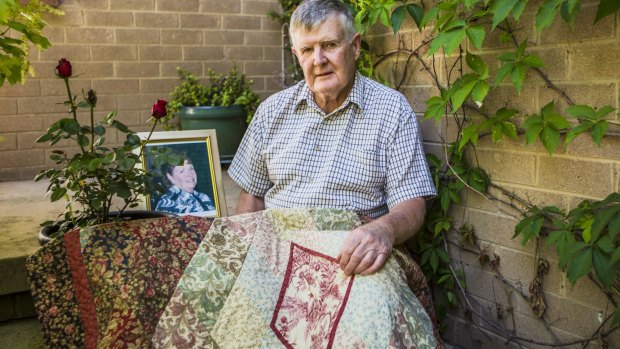 Ian Holyland, whose wife Barbara died in 2011, keeps her memory alive with the help of a floral quilt donated by Gift of Life. 