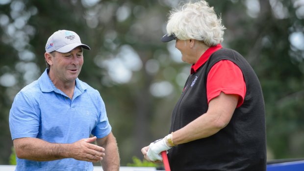 Canberra Raiders coach Ricky Stuart and Laura Davies during the Canberra Classic ProAm. 