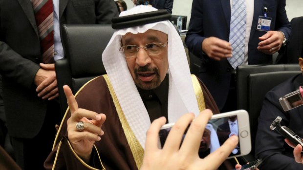 Saudi Arabia's energy minister, Khalid Al-Falih, speaks to reporters in Vienna where OPEC member states decided to curb oil production for the first time in eight years. 