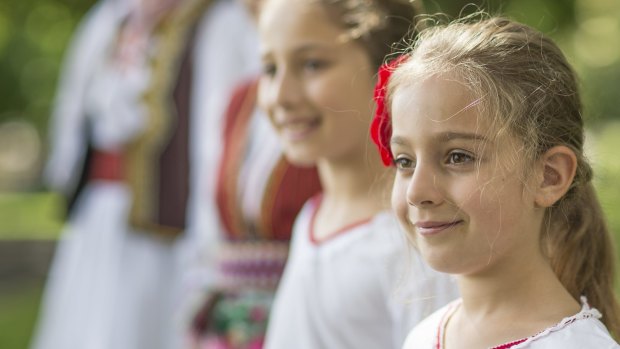 Lilly Nedeska, 6, and members of the Macedonian dance group in Queanbeyan 