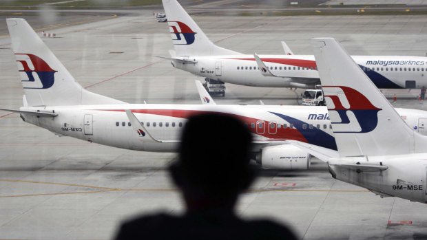 Malaysia Airlines planes on the tarmac at Kuala Lumpur International Airport, where the ill-fated MH370 flight took off.