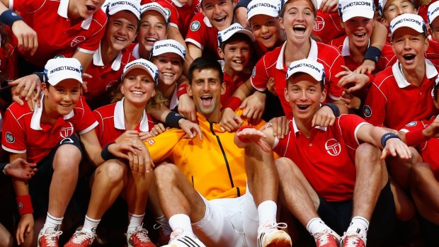 Novak Djokovic with the ball kids at Monte Carlo.