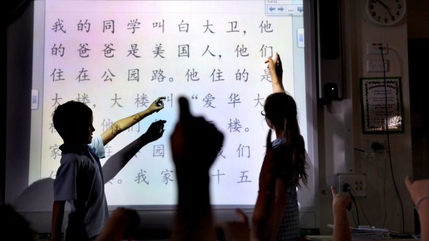 Year three students learning Mandarin in a multilingual lesson.
