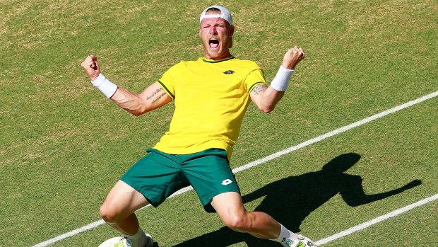 An extremely happy Sam Groth celebrates his win.