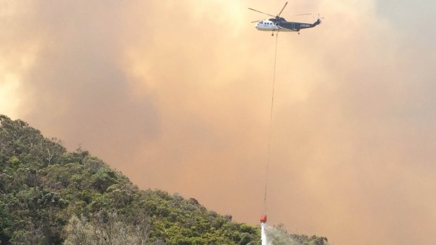 A helicopter tackles the blaze on Christmas Day.