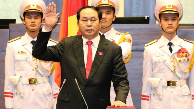 New Vietnamese President Tran Dai Quang takes the oath of office.