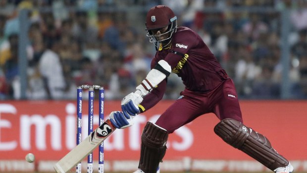 Marlon Samuels in full flight for the West Indies.