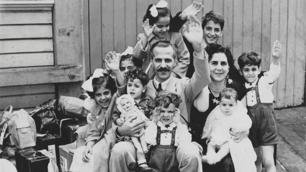 New Australians: Mr and Mrs John Manche with their family of nine children on the wharf at Circular Quay, Sydney, in 1955.