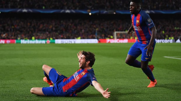 The hero: Sergi Roberto celebrates scoring Barca's sixth goal - the winner.