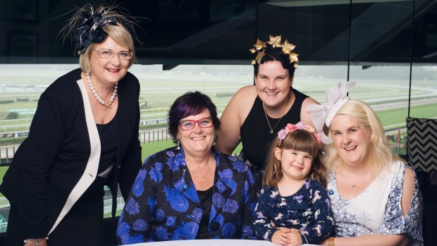 Family affair: Winx co-owner Debbie Kepitis surrounded by her sister Lyn (left), daughters Lara (at rear) and Alinta (right), and granddaughter Eden.