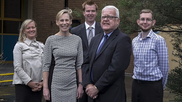 Connected: Despite perceptions of distance education being a lonely, old-fashioned affair, it is a school that reaches out, via technology, to its students. Pictured are (from left) Maya Graham, assistant principal Fiona Webster, Sean Tehan,  acting principal Bretton New and Nick Irvine. 