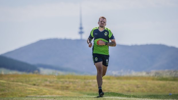 Blake Austin takes to the running track at Stromlo Forest Park as the Raiders begin  pre-season training.