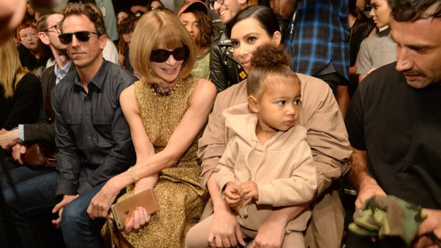 Seth Meyers, Anna Wintour, Kim Kardashian West and North West attend Kanye West Yeezy Season 2 during New York Fashion Week at Skylight Modern on September 16 in New York City.