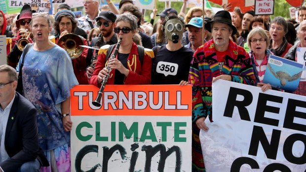 Environmentalists took to Melbourne's streets to protest a potential government loan to coal giant Adani.