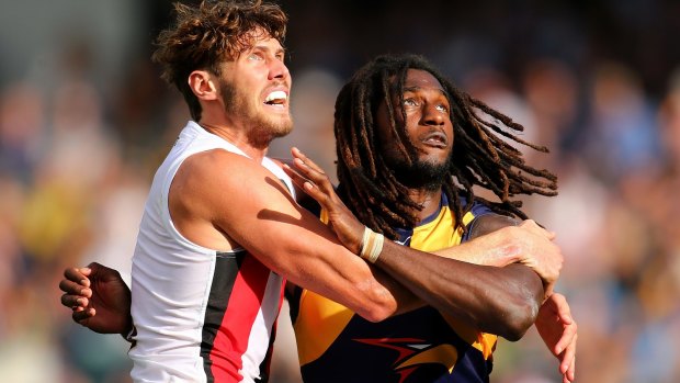 Tight tussle: Tom Hickey and Nic Naitanui during a ruck contest.